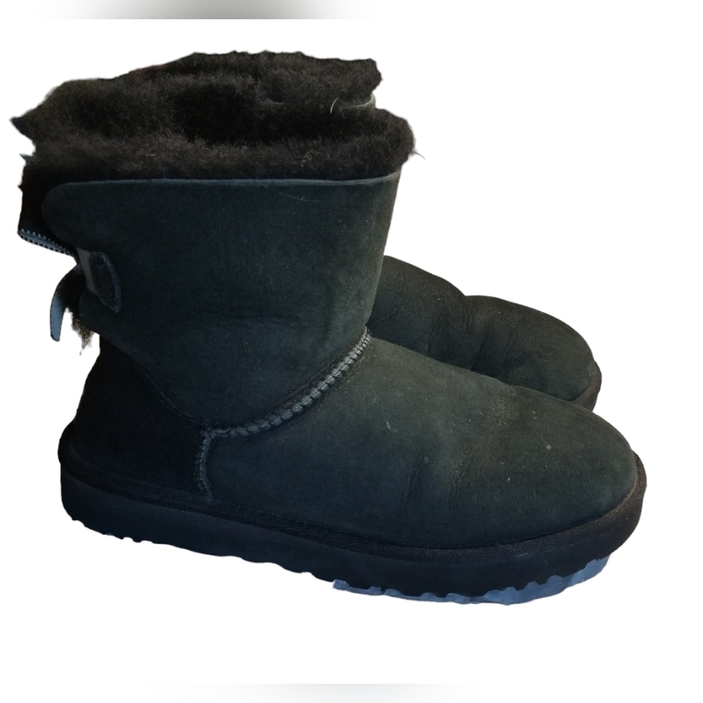 Black uggs with bows in the back
